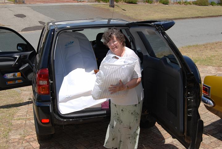 DSC_0048.JPG - Precious cargo - Mum packing my dress and veil for the road trip